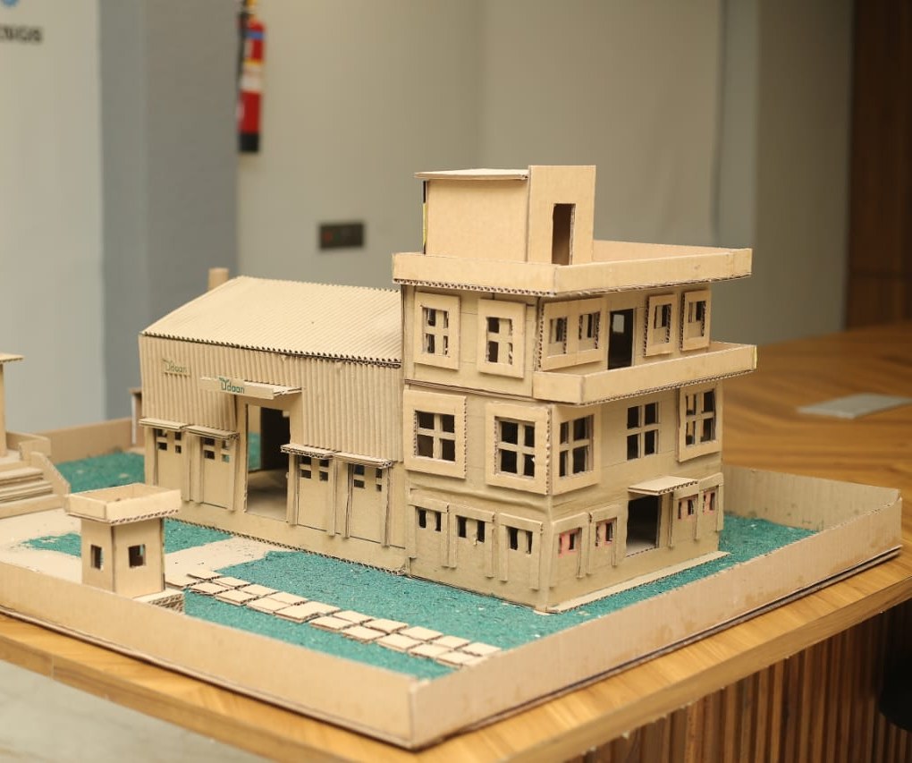 An architectural model built from corrugated paper